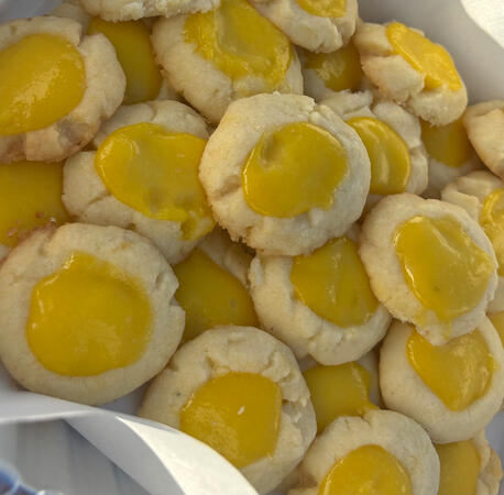 Coconut flavored thumbprints with salted mango lime curd!