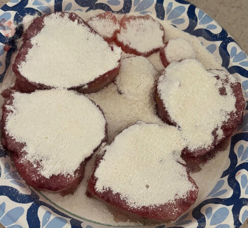 Rose Turkish Delight infused with lemon zest and chopped pistachios dusted in sugar and almond meal!